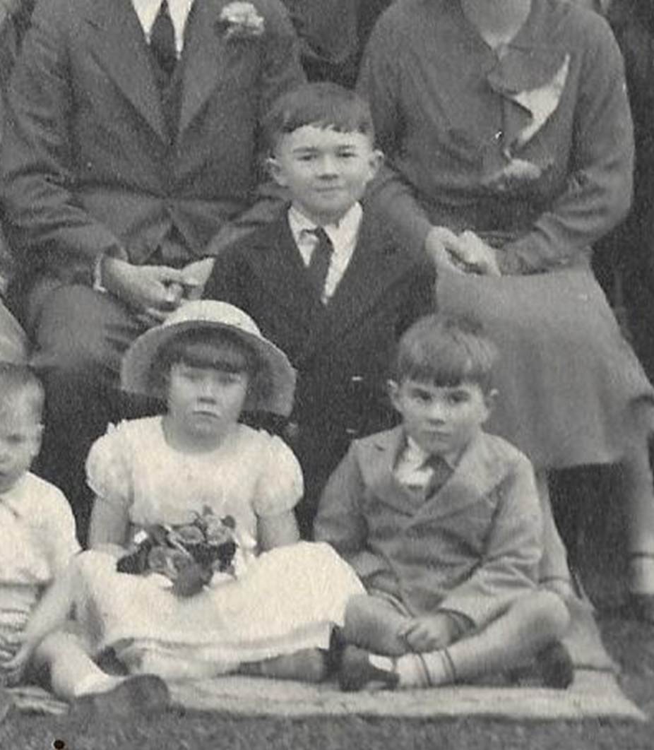 A group of people posing for a photo
Description automatically generated